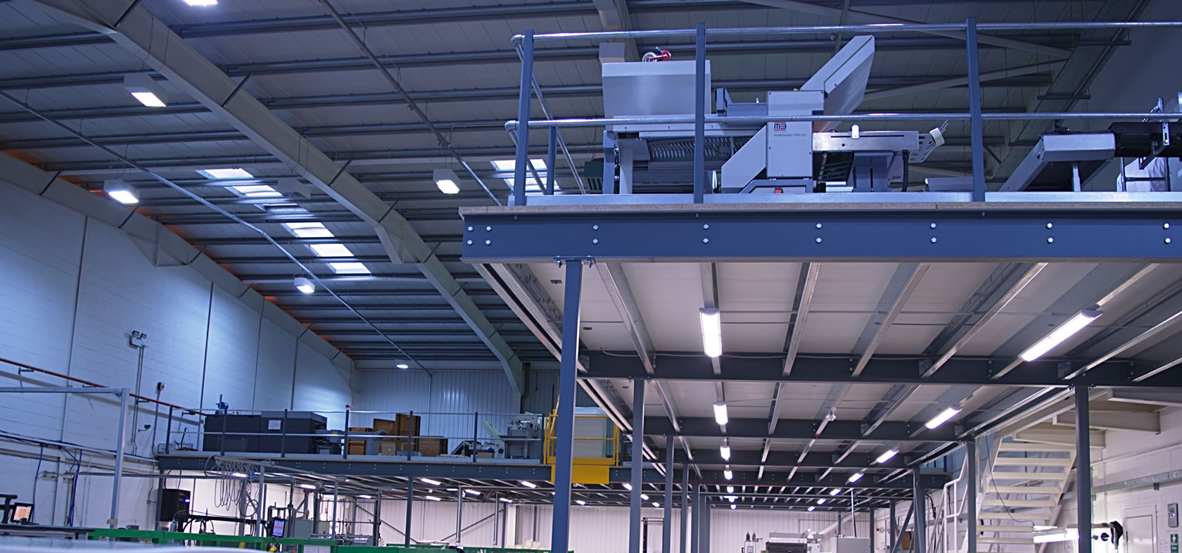 Mezzanine floor costs in warehouse facility installed by Thistle Systems, Scotland.