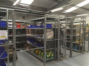 Wire mesh partitioning providing secure warehouse storage, Scotland.